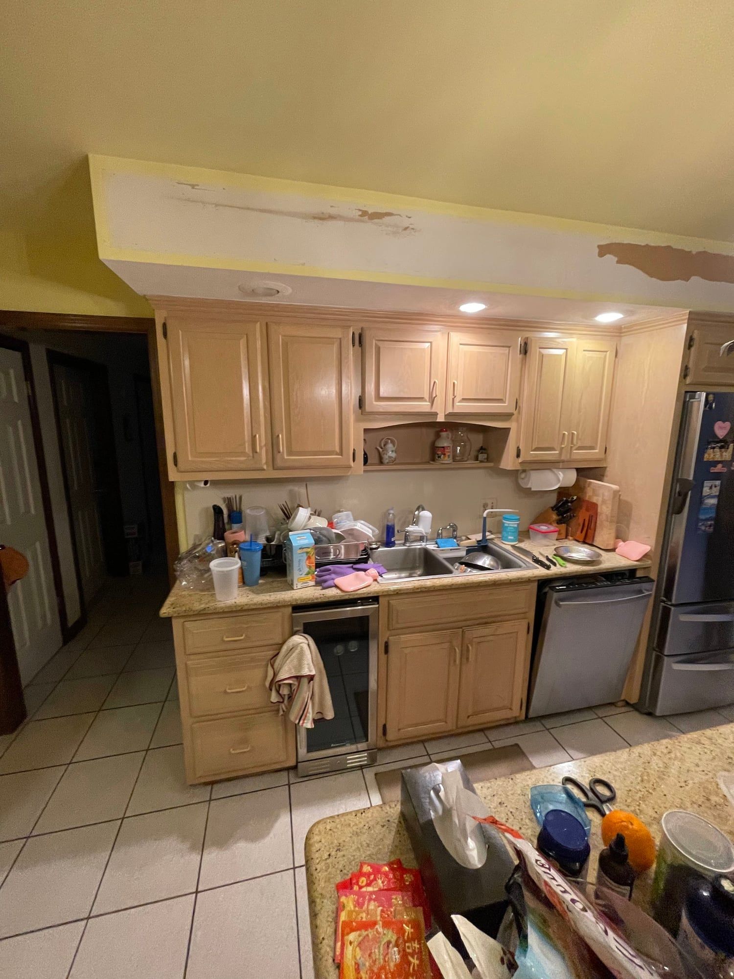 Before: oak cabinets around the old sink