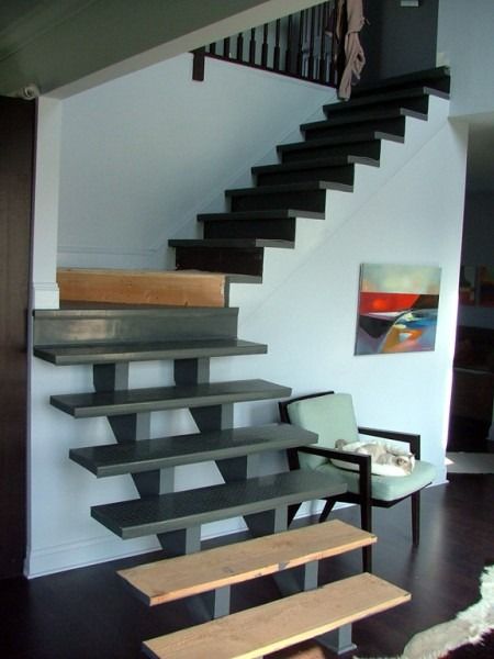 Open-riser staircase with wood treads on a steel stringer