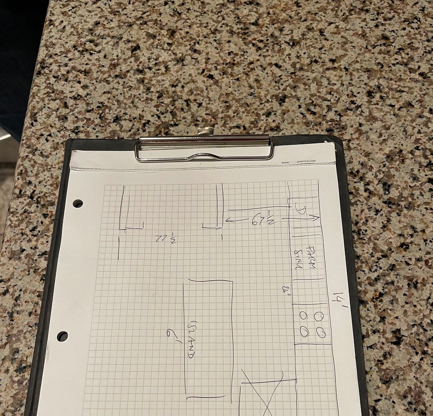 Hand-drawn kitchen layout on graph paper